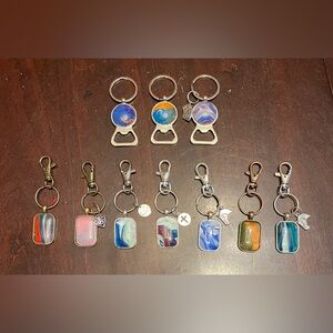 7 Keychains And 3 Bottle Openers